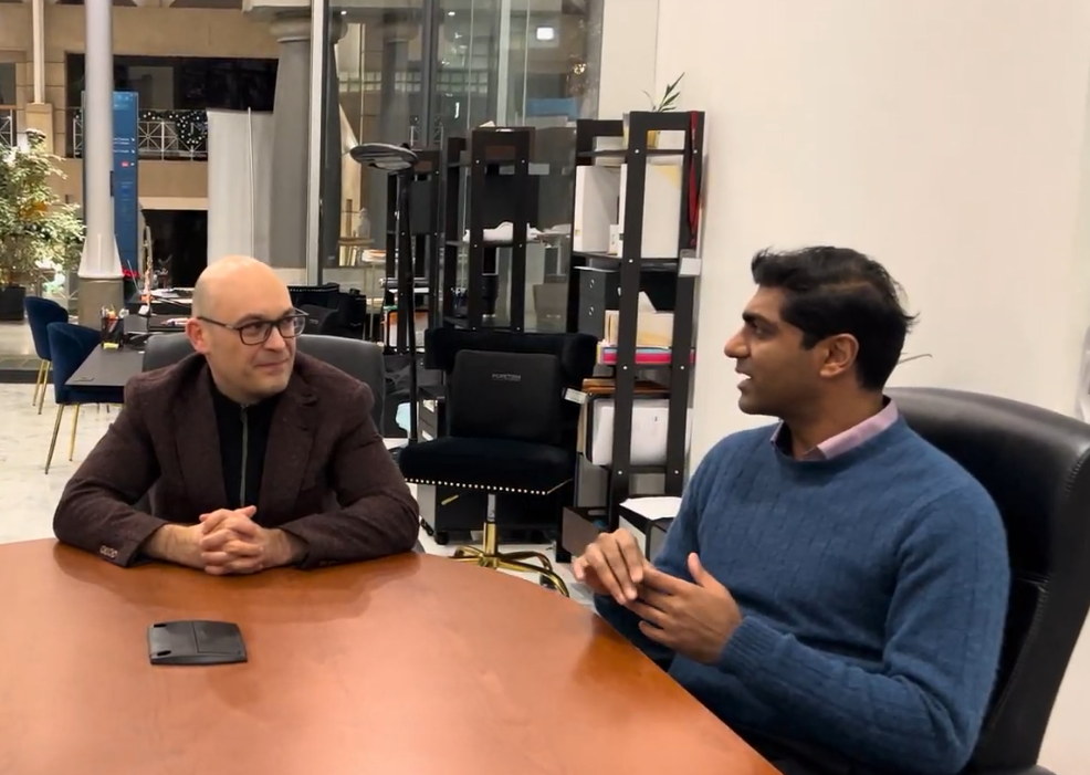 Fairworld Immigration Consultants Mathai and Pavel in a meeting with immigration client.